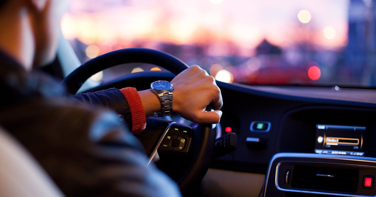 Car insurance policy documents and keys explaining how coverage works