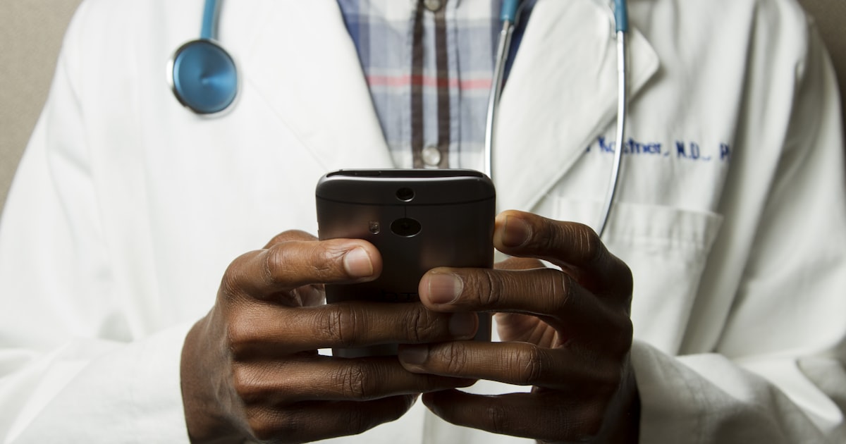 Doctor in hospital representing top health insurance company coverage