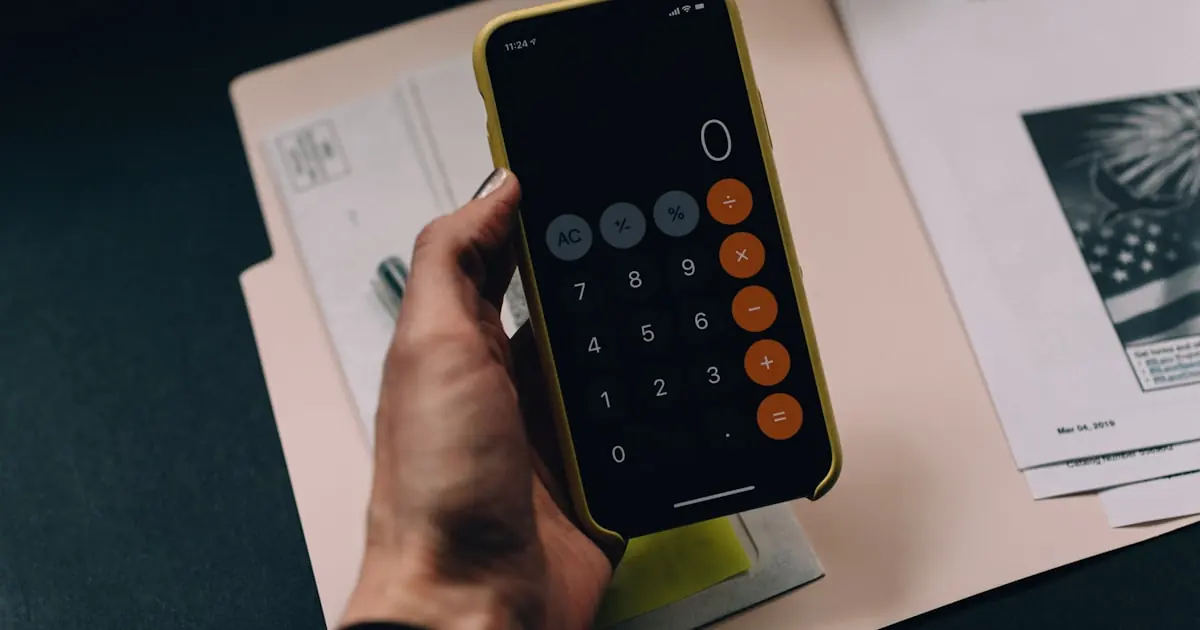 Tax forms and calculator representing HSA and FSA savings accounts